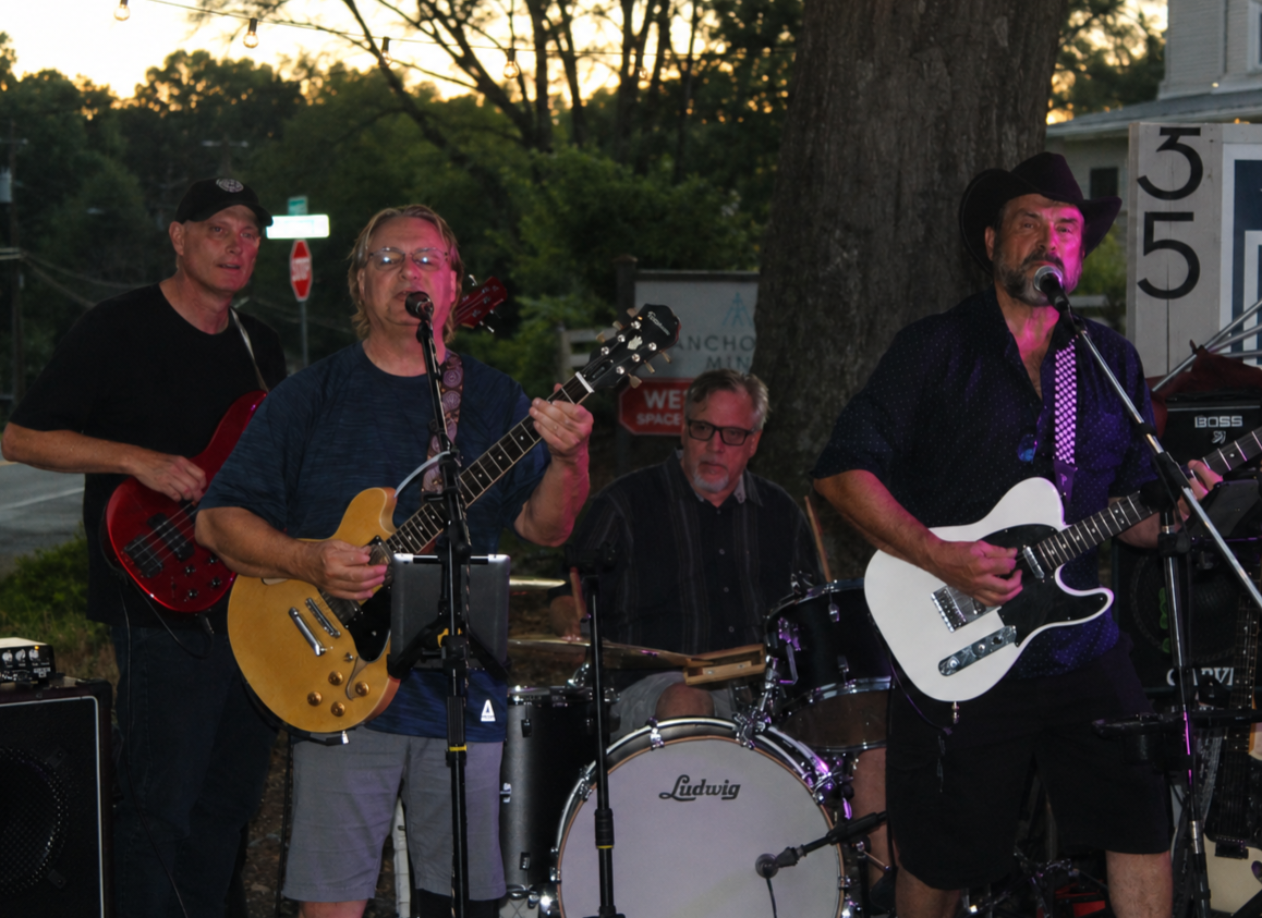 Big Creek Country Band performing live at an outdoor evening show